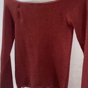 off shoulder long sleeve with buttons top in a size medium.